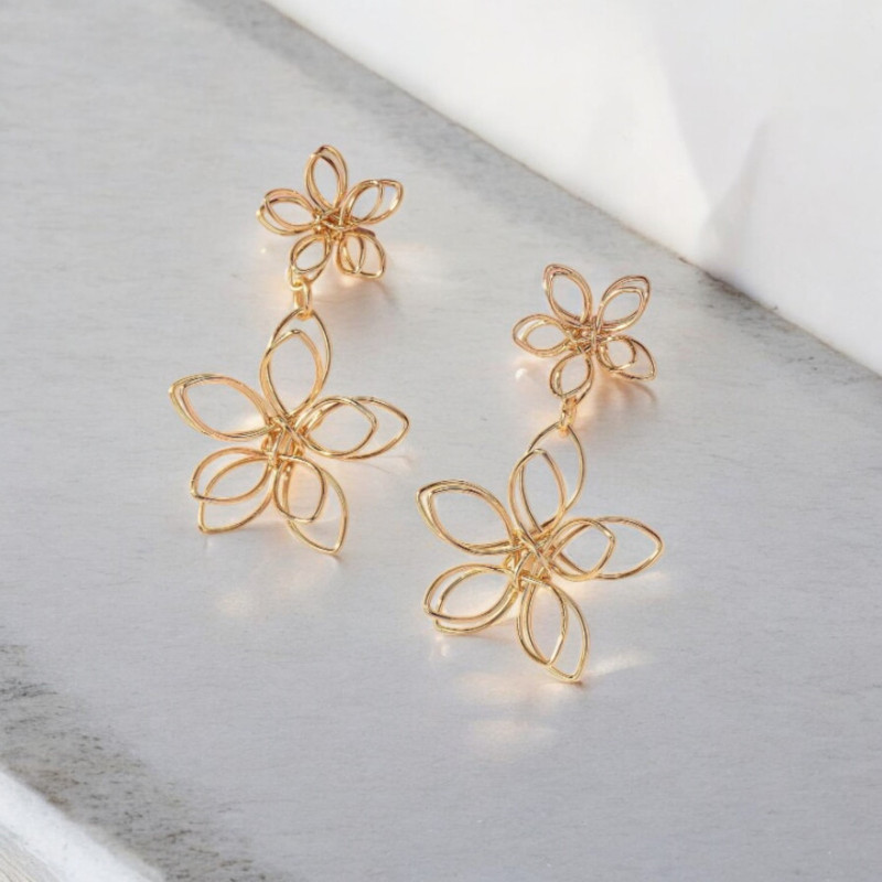 Boucles d'oreilles double fleurs dorées