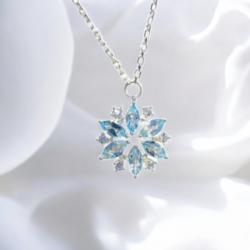 Collier argenté flocon de neige bleu ciel