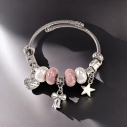 Bracelet charms argenté noeud papillon rose