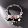 Bracelet charms argenté noeud papillon rose