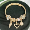 Bracelet charms doré plume et coeur bleu