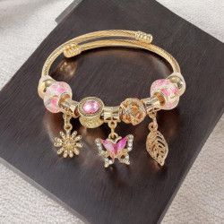Bracelet charms doré papillon rose Acier