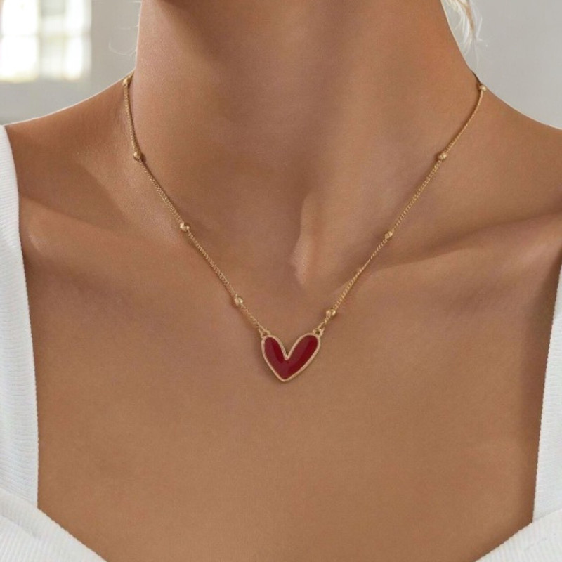 Collier doré coeur rouge acier