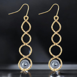 Boucles d'oreilles dorée anneaux et perle métallique