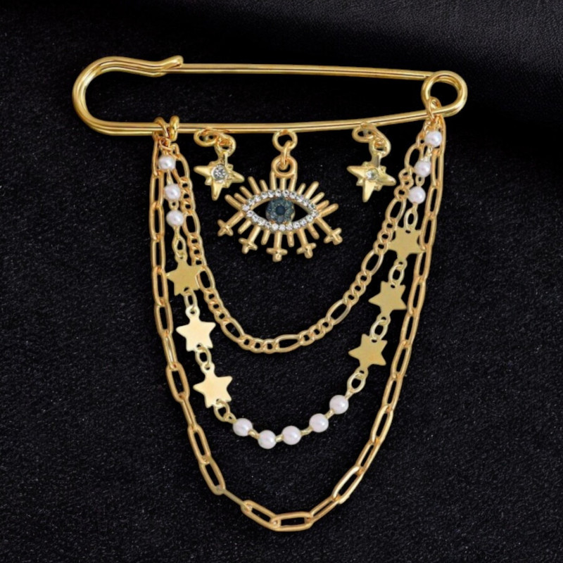 Broche dorée mauvais oeil et chaînettes