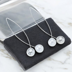 Boucles d'oreilles argentées croisée avec perles Acier