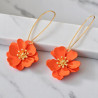 Boucles d'oreilles dorées pendantes fleurs oranges