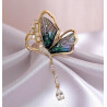 Broche dorée papillon multicolore