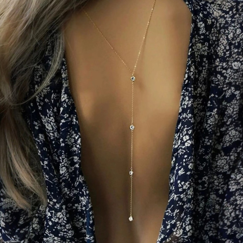 Collier de dos doré strass