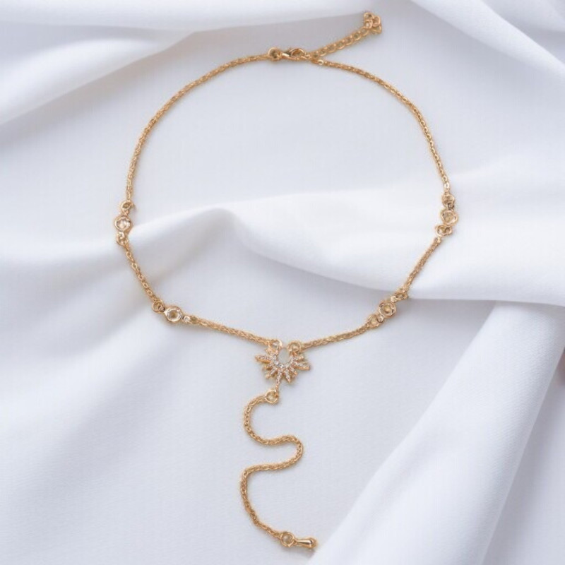 Collier plongeant doré soleil et goutte