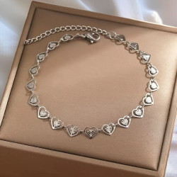 Bracelet argenté coeurs ajourés Acier