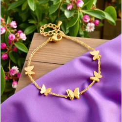 Bracelet doré papillons en relief Acier