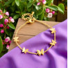Bracelet doré papillons en relief Acier
