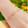 Bracelet doré papillons en relief Acier