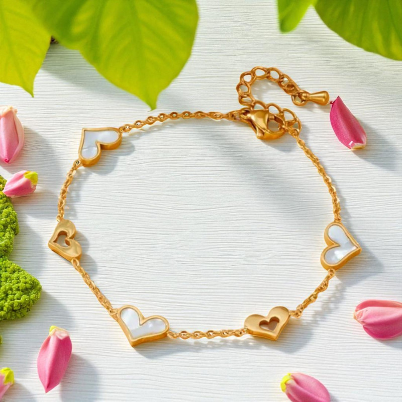 Bracelet doré coeurs ajourés et blanc nacré Acier