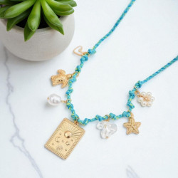 Collier tressé bleu clair tortue et étoile de mer