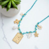 Collier tressé bleu clair tortue et étoile de mer