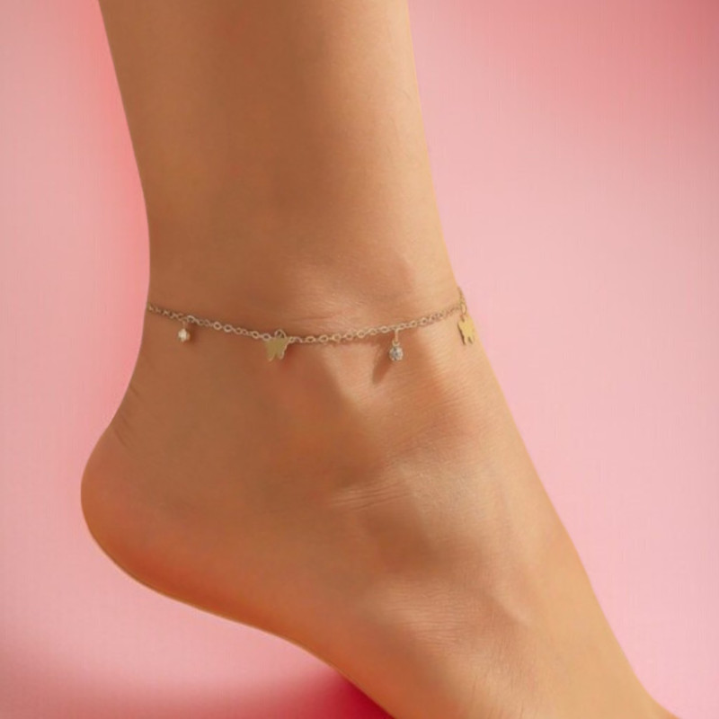 Chaîne de cheville dorée papillon et strass Acier