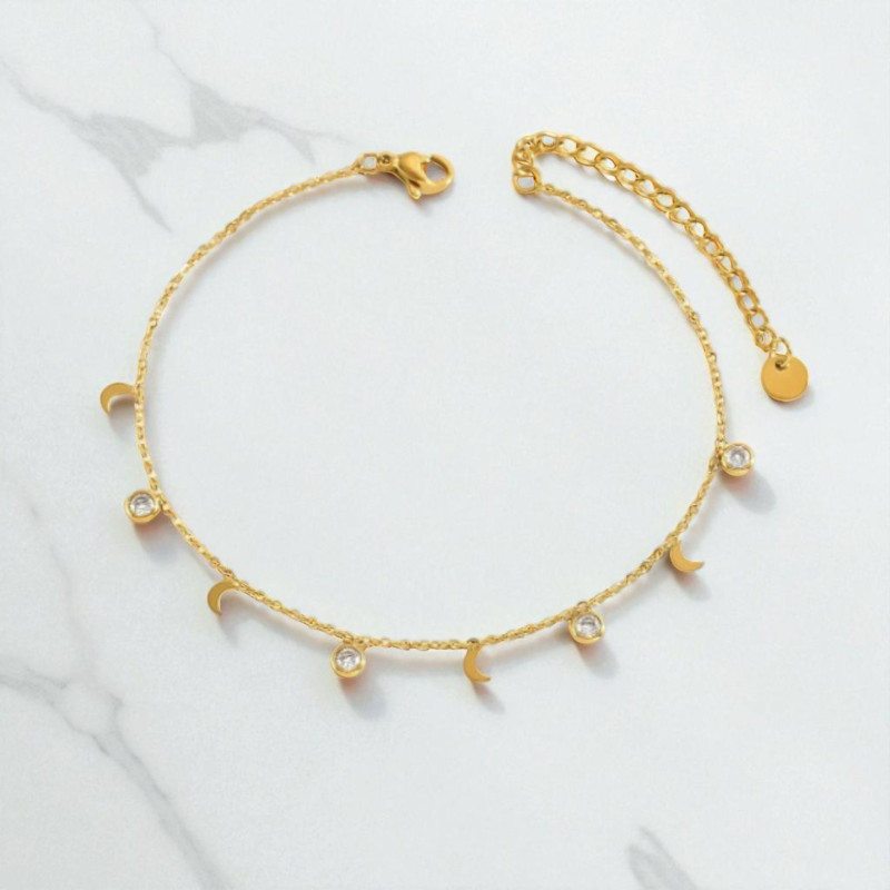 Chaîne de cheville dorée lune et strass Acier