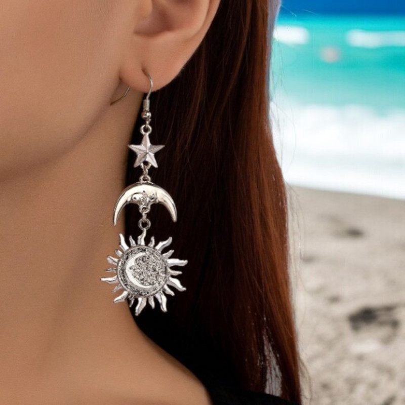 Boucles d'oreilles argentées étoile, soleil et lune