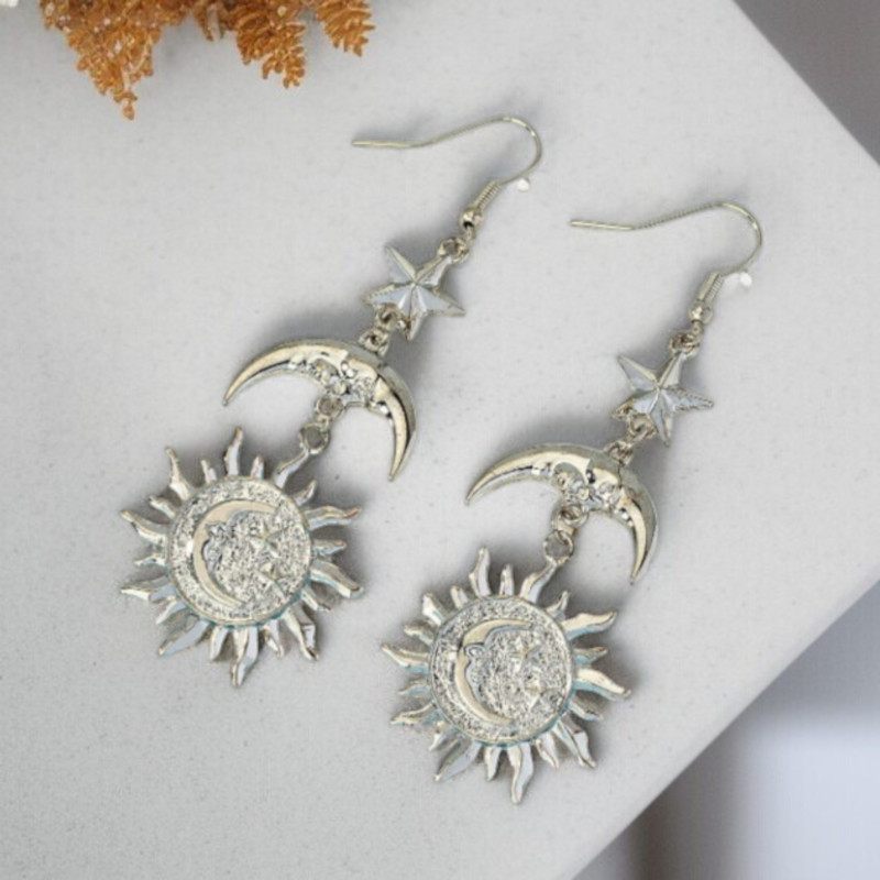 Boucles d'oreilles argentées étoile, soleil et lune