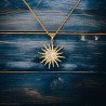 Collier doré soleil et lune croissante orné de strass