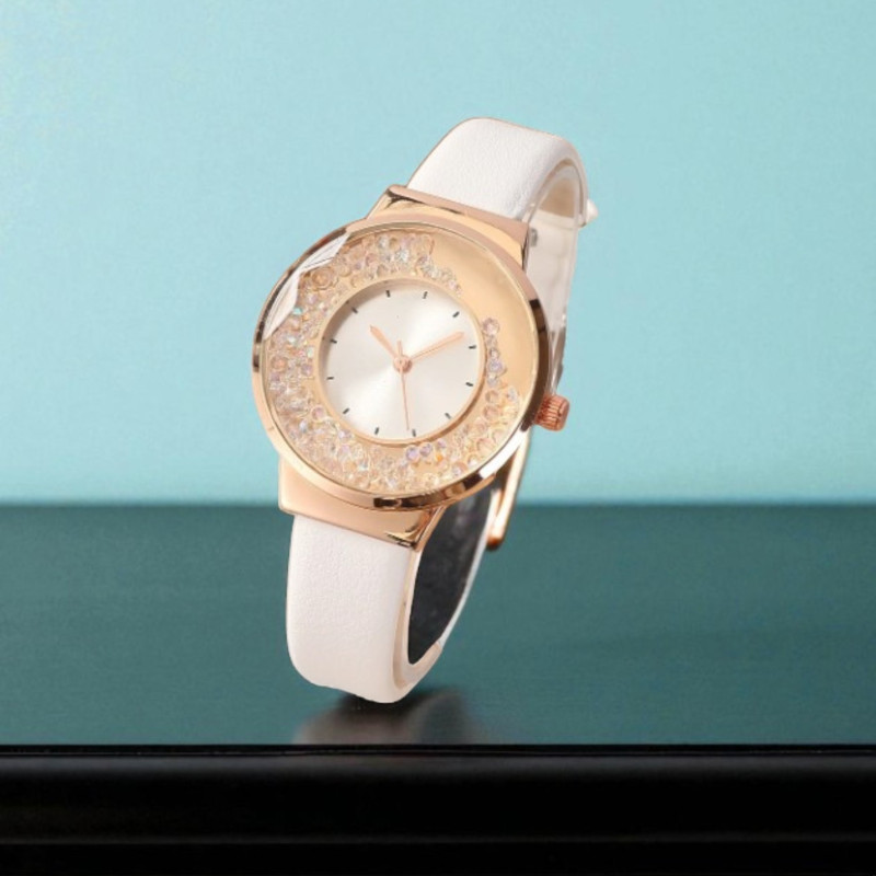 Montre cristaux blancs et cadran doré