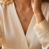 Collier argenté fleur rouge rotative Acier