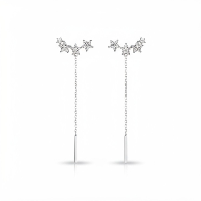 Boucles d'oreilles pendantes argentées étoiles et strass
