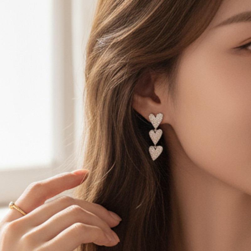 Boucles d'oreilles argentées cœurs et strass