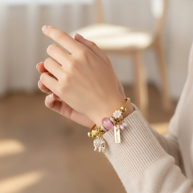 Bracelet charms doré éléphant rose Acier