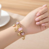 Bracelet charms doré coeurs roses et peace and love Acier