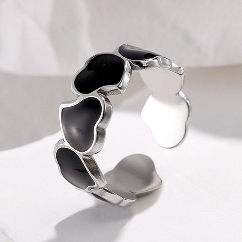 Bague ajustable argentée coeurs noirs Acier