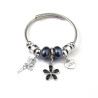 Bracelet charms argenté fée, fleur et perles noires Acier