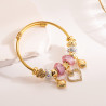 Bracelet charms doré coeurs et perles roses Acier