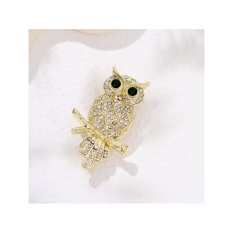 Broche dorée hibou strass blanc