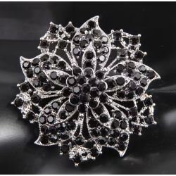 Broche argentée fleur avec strass noirs
