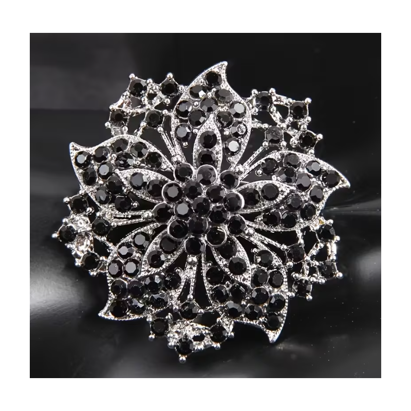 Broche argentée fleur avec strass noirs