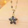 Collier doré fleur zircon bleu Plaqué or