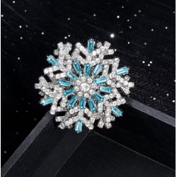 Broche flocon de neige bleu argentée