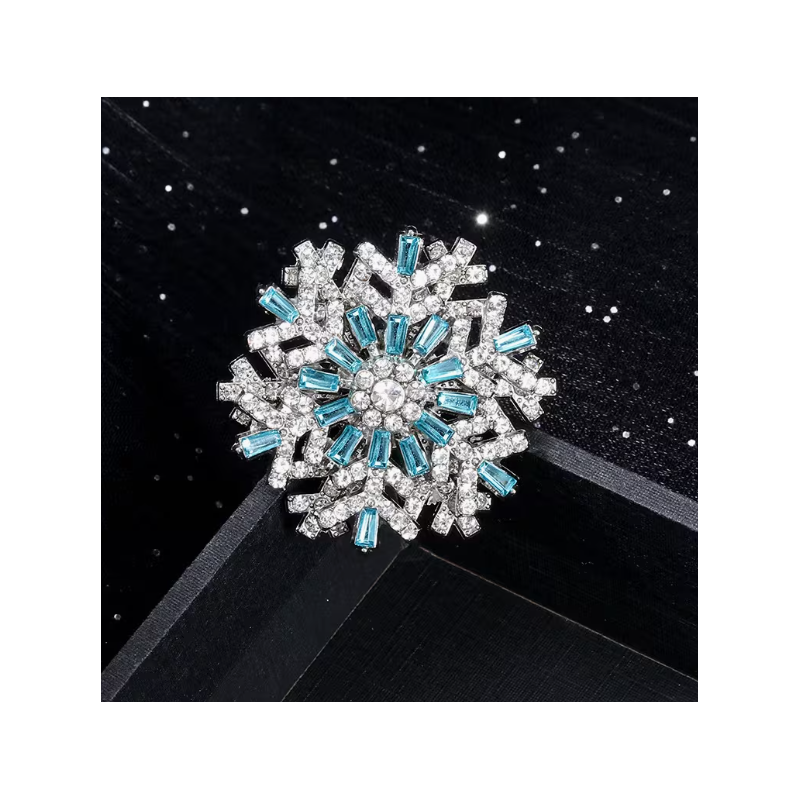 Broche flocon de neige bleu argentée