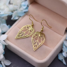 Boucles d'oreilles feuilles ajourées dorées Acier