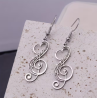 Boucles d'oreilles note de musique ajourée argentée Acier