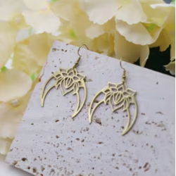 Boucles d'oreilles croissant de lune et lotus dorés Acier