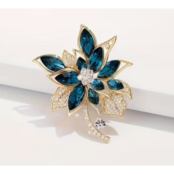 Broche dorée fleur bleue