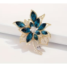 Broche dorée fleur bleue