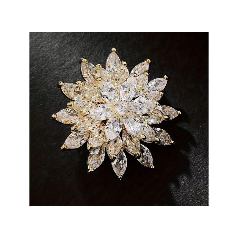 Broche dorée fleur zircon blanc