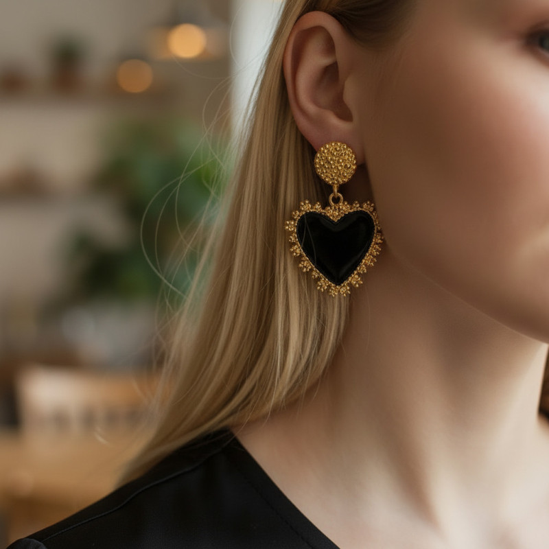 Boucles d'oreilles dorées coeur noir métal texturé