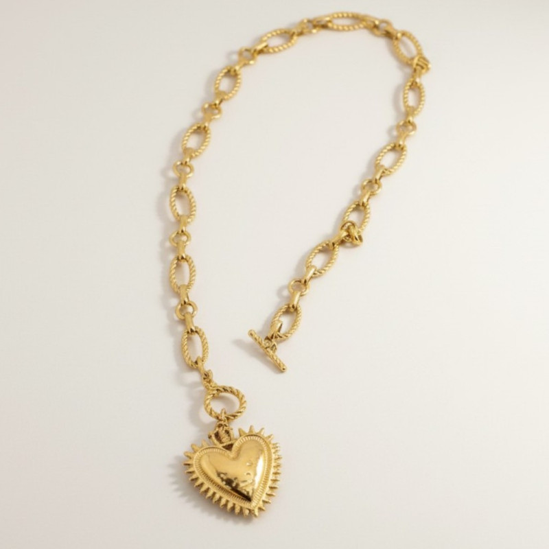 Collier grandes mailles dorées coeur rayonnant