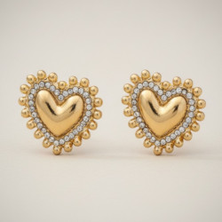 Clous d'oreilles dorés coeur rayonnant